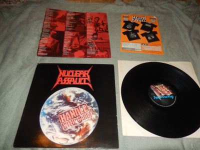 Nuclear assault - Handle with care vinyyli