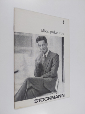 Mies pukeutuu