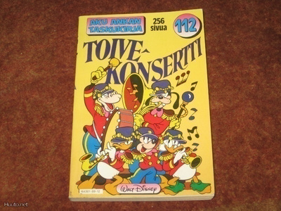 AKU ANKAN TASKUKIRJA 112 - TOIVEKONSERTTI