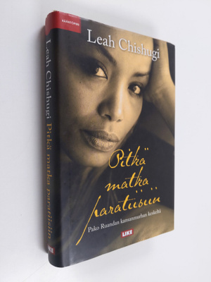 Leah Chishugi : Pitkä matka paratiisiin : pako Ruandan ka...