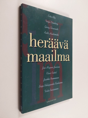 Heräävä maailma : Suomen keskustan 90-vuotisjuhlakirja