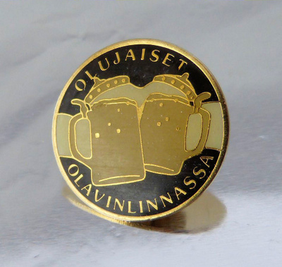 OLUJAISET OLAVINLINNASSA rintamerkki