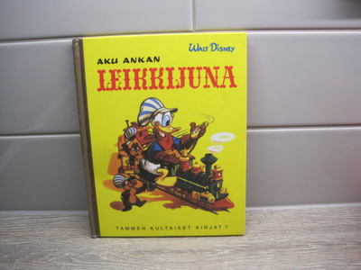 TAMMEN KULTAISET KIRJAT, DISNEY AKU ANKAN LEIKKIJUNA no 7