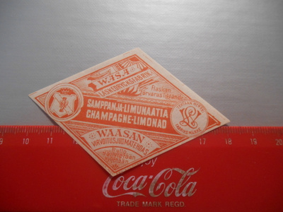 Samppanja-Limunaatia Waasan virvoitusjuomatehdas etiketti