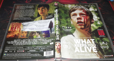 What Keeps You Alive / It Stains The Sands Red (dvd)