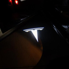 Tesla logolliset ovivalot — heijasta logo maahan - pikkukuva 1