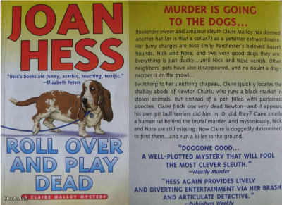 Joan Hess: Roll over and play dead   p. 2003