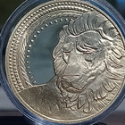 Kullanvärinen kolikko Leijona. Halkaisija - 38 mm. - pikkukuva 2