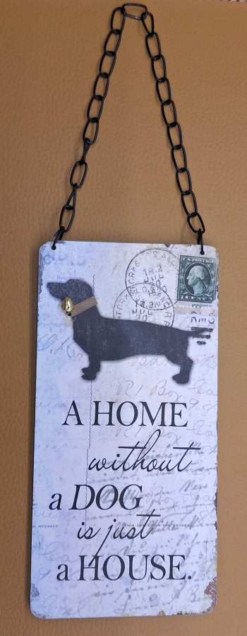Kyltti A home without a dog is just a house