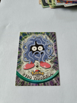 114 TANGELA TOPPS