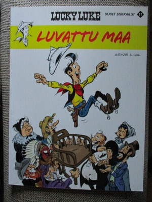 Lucky Luke LUVATTU MAA (UUDET SEIKKAILUT NRO 11)