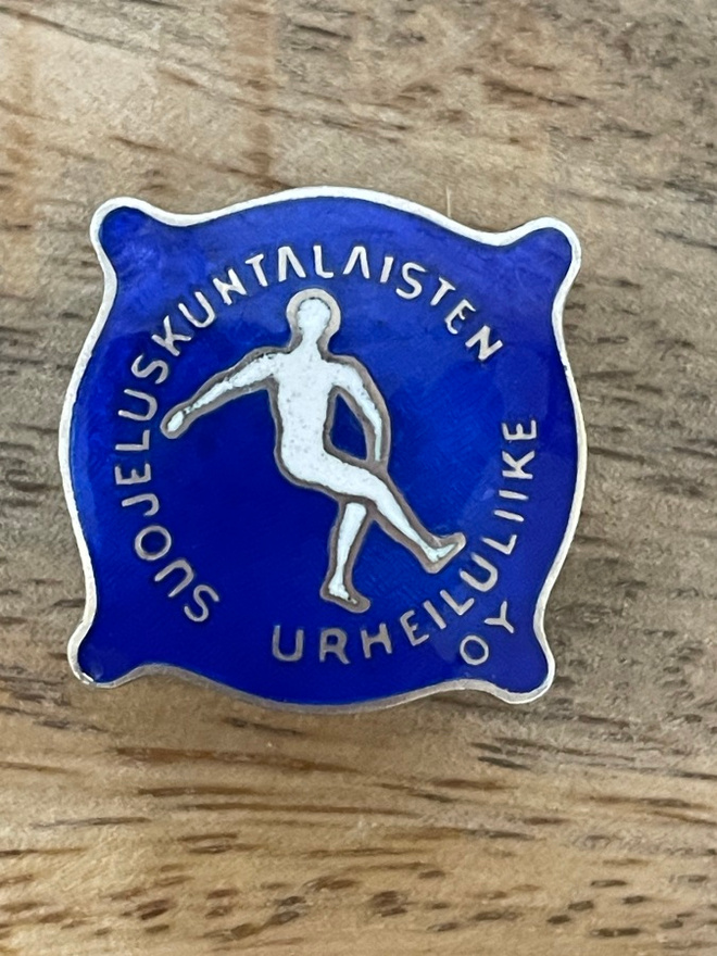 Suojeluskuntalaisten urheiluliike Oy:n merkki