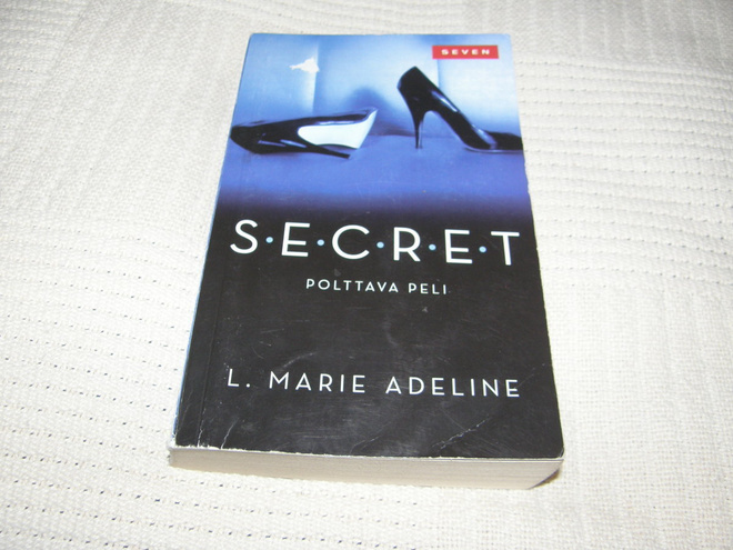 L. Marie Adeline Secret Polttava peli  -pok