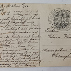 Leidi kori kädessään ja harava toisessa niittytiellä p. 1910 - pikkukuva 2