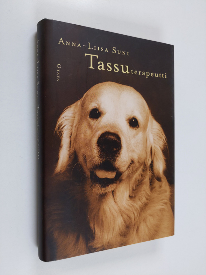 Anna-Liisa Suni : Tassuterapeutti : koirista ja vähän mui...