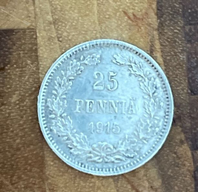 Hopeinen Autonomian ajan Suomen v. 1915 kolikko, 25
