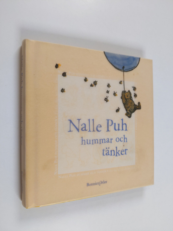 A. A. Milne : Nalle Puh hummar och tänker