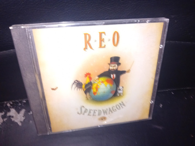 CD Reo Speedwagon : The Earth A Small Man his Dog and Chicke