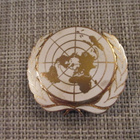 YK United Nations Barettimerkki . - pikkukuva 1