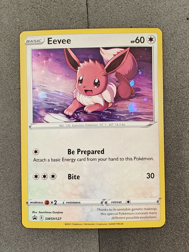 Eevee SWSH127 Cosmos Holo Black Star Promo