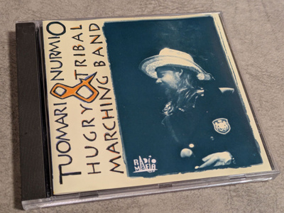 Tuomari Nurmio & Hugry Tribal Marching Band (CD) KUIN UUSI!!