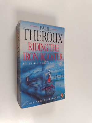 Paul Theroux : Riding the iron rooster : by train through...