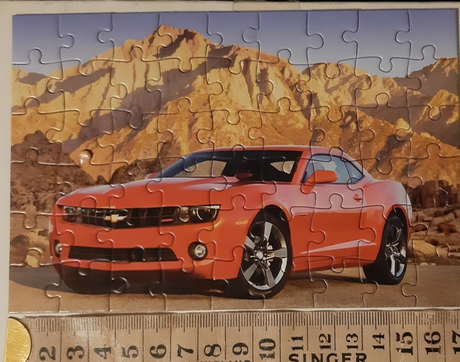 Chevrolet Camaro palapeli ja toinen auto palapeli myös