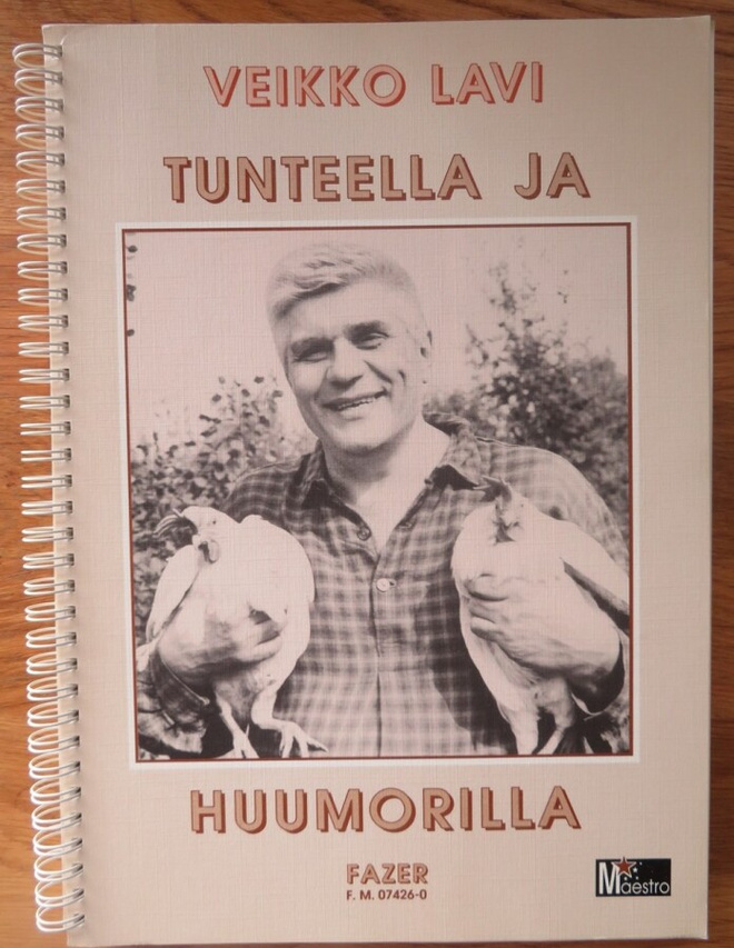 VEIKKO LAVI : TUNTEELLA JA HUUMORILLA