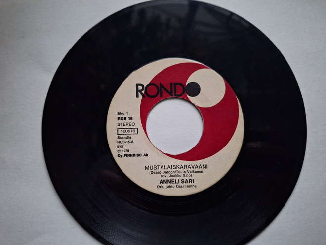 ANNELI SARI - MUSTALAISKARAVAANI 7 " Single