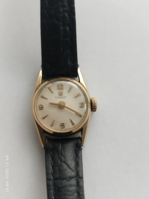 Tissot 14k naisten kultakello