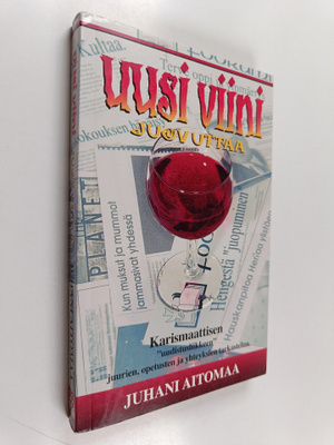 Juhani Aitomaa : Uusi viini juovuttaa : karismaattisen uu...