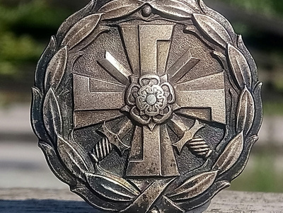 Sodanaikainen veteraanimerkki. Halkaisija - 36 mm.