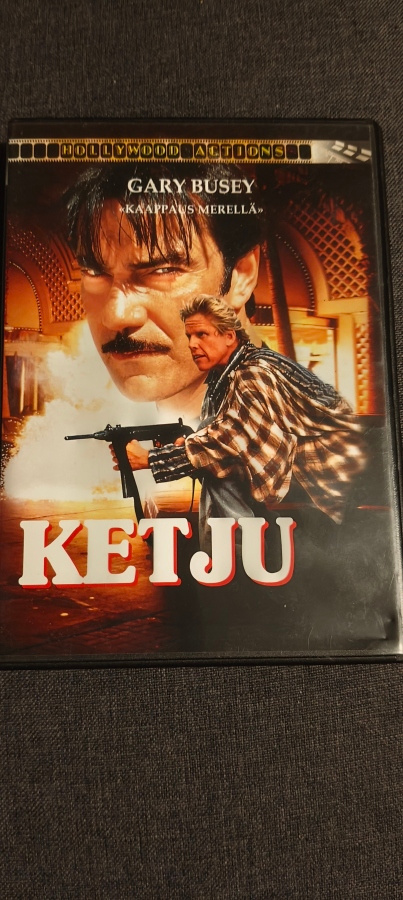 Ketju. The chain Gary Busey