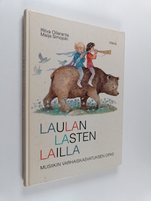 Ritva Ollaranta : Laulan lasten lailla : Musiikin varhais...