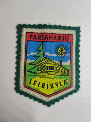 Matkailumerkki: Partaharjun leirikylä