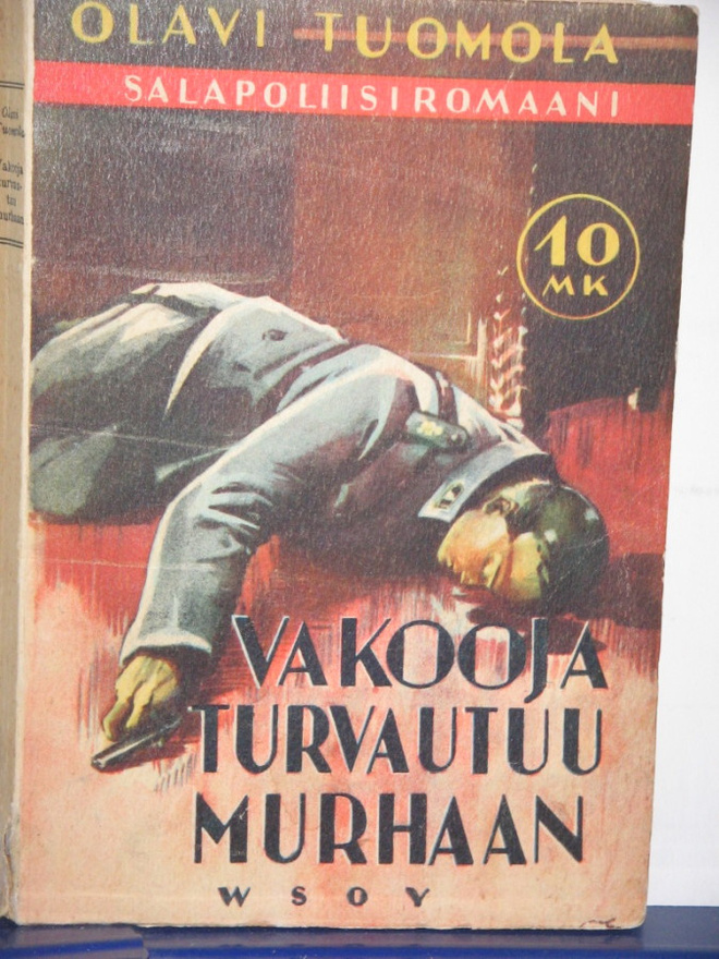 Olavi Tuomola : VAKOOJA TURVAUTUU MURHAAN