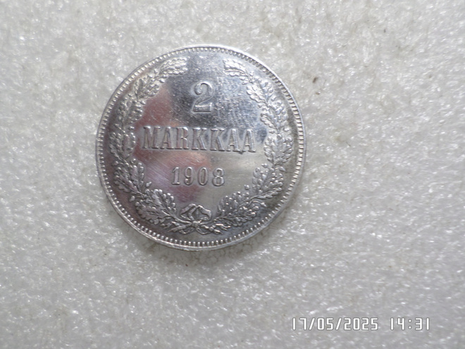 2  mk 1908   hopeaa  kulkematon   lyöntikiiltoinen rahaa .