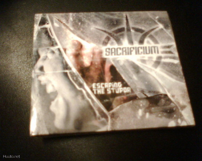 CD  Sacaificium  ESCAPING THE STUPOR (Sis.pk:t)