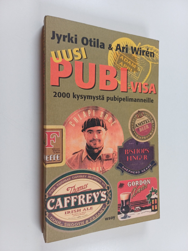 Jyrki Otila : Uusi pubi-visa : 2000 kysymystä pubipeliman...