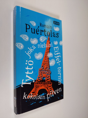 Romain Puertolas : Tyttö joka nielaisi Eiffel-tornin koko...