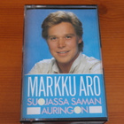Markku Aro:Suojassa saman auringon-C-kasetti. - pikkukuva 1