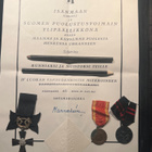 Vapaudenristi miekkoineen ja virallinen kirje - pikkukuva 1