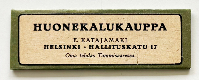 Vanha Katajamäen huonekalukaupan mainos magneettina *20-luku