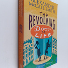 Alexander McCall Smith : The revolving door of life : a 4... - pikkukuva 1