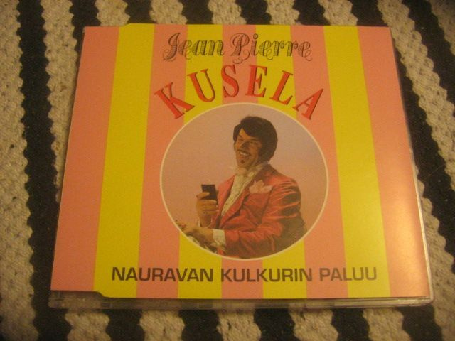 Jean Pierre Kusela - Nauravan kulkurin paluu (cds)