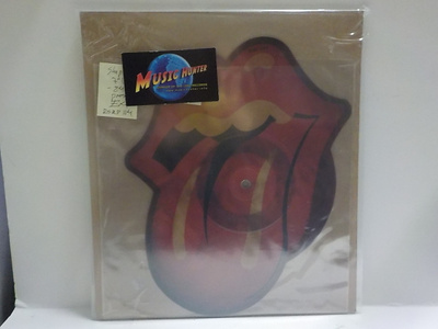 THE ROLLING STONES - SHE WAS HOT EX+ 7" SHAPED VINYL
