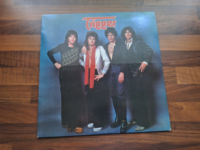 TRIGGER . LP