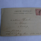 Nuori leidi kukkia hiuksissaan toivottaa onnea, 1900-l. alku - pikkukuva 2