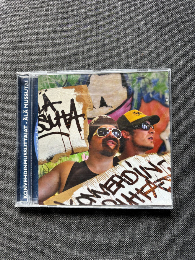 Konvehdinmussuttajat – Älä Mussuta CD (MONSP 051)