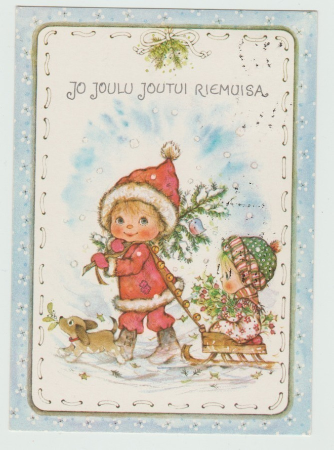 Tyttö vetää rekeä , kyydissä pikkusisko